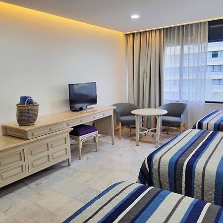Beachfront Getaway Condo Cancun Bagian luar foto