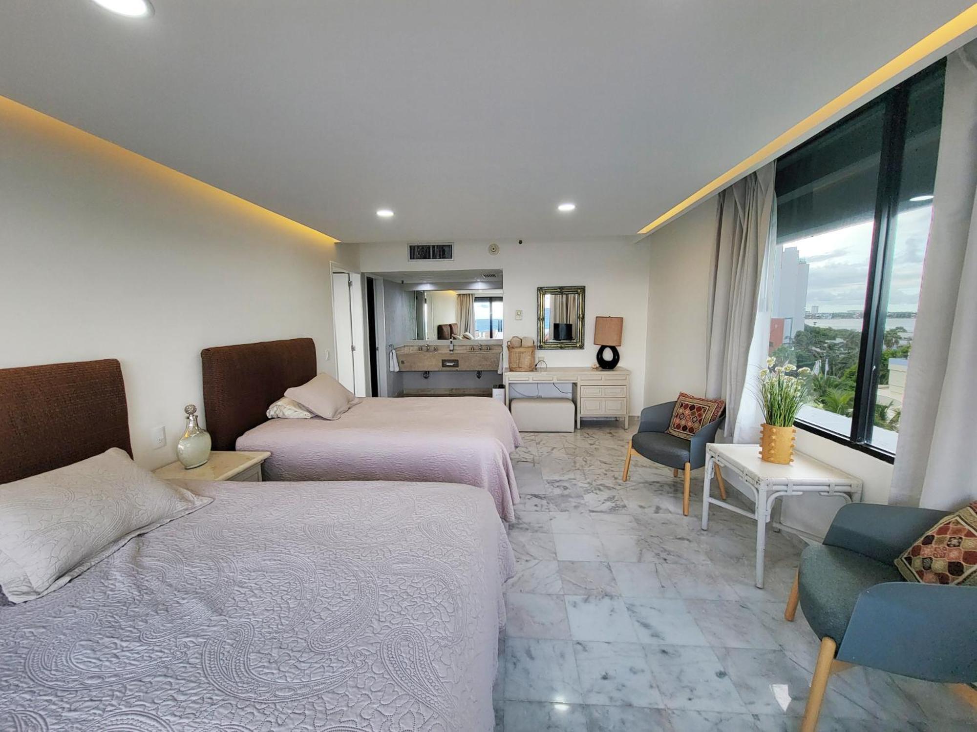 Beachfront Getaway Condo Cancun Bagian luar foto