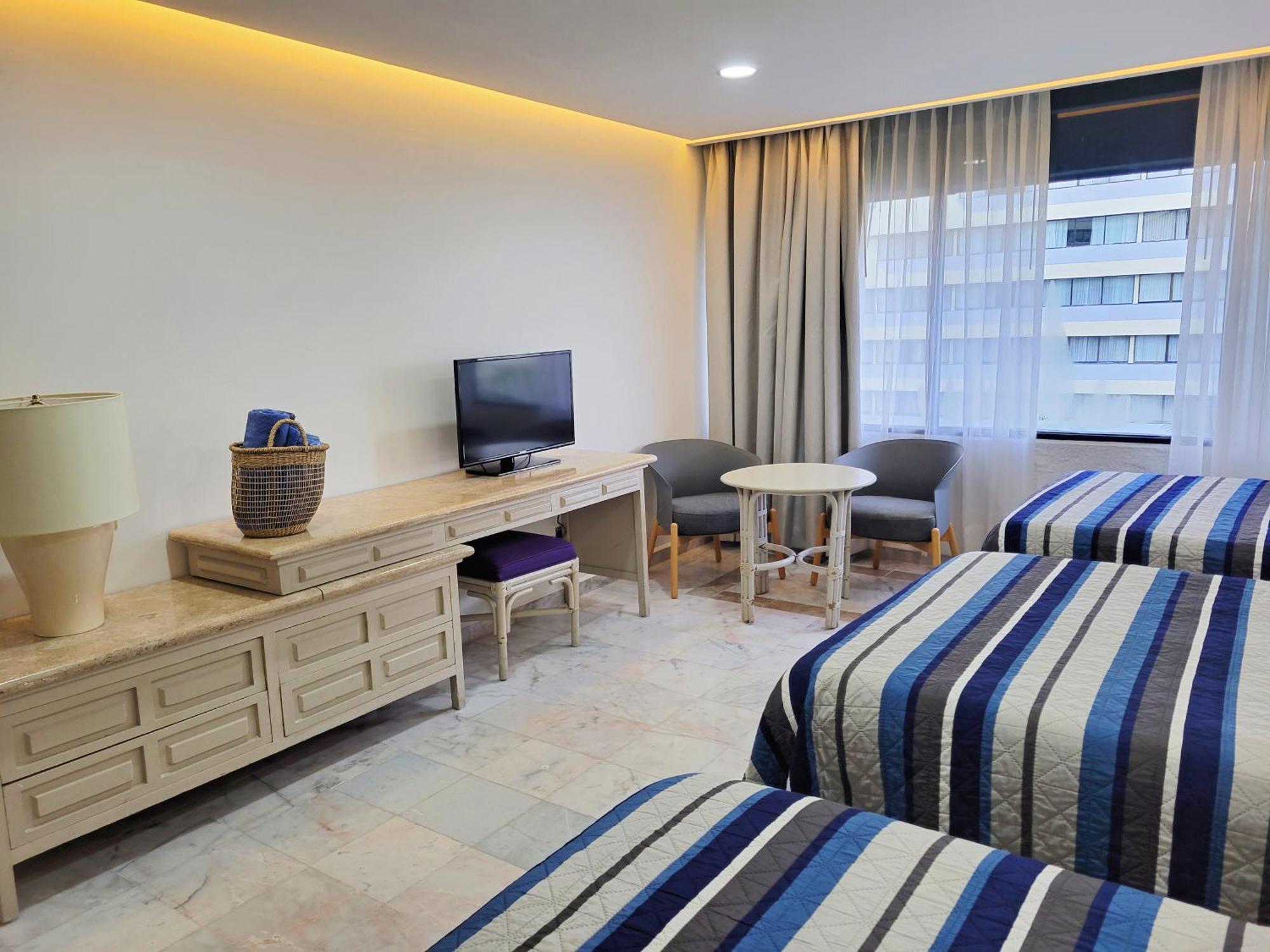 Beachfront Getaway Condo Cancun Bagian luar foto